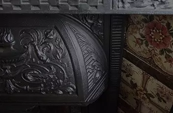 detail of cast iron fireplace